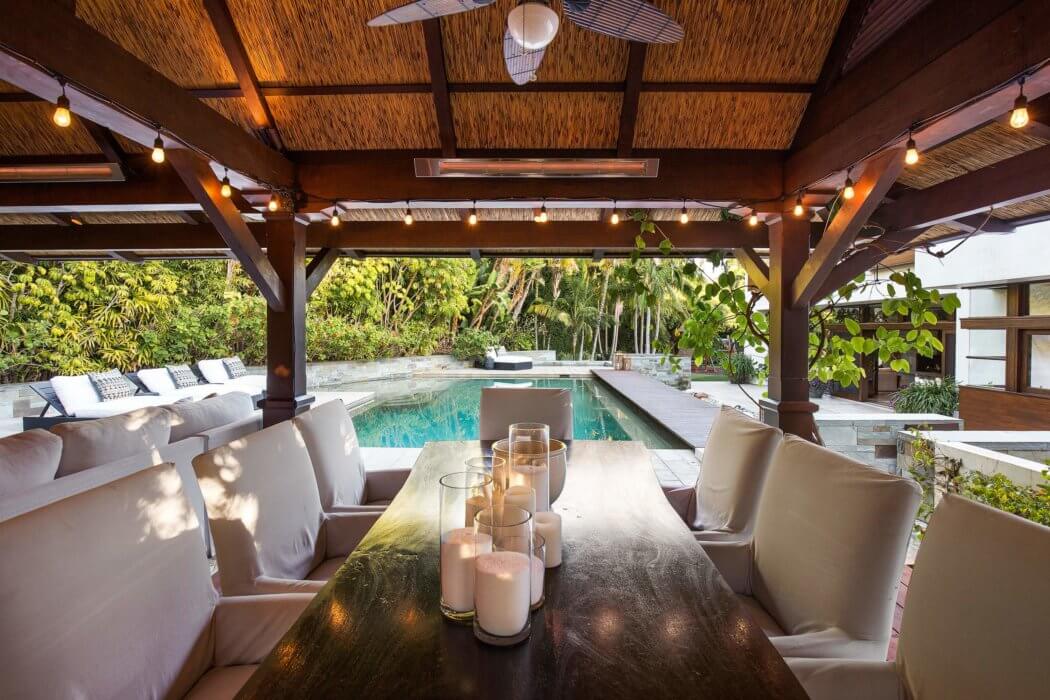 Infratech ceiling-mounted heaters over an outdoor dining cabana